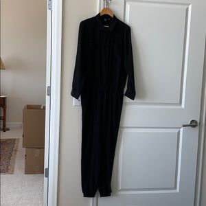 Black silk jumpsuit.